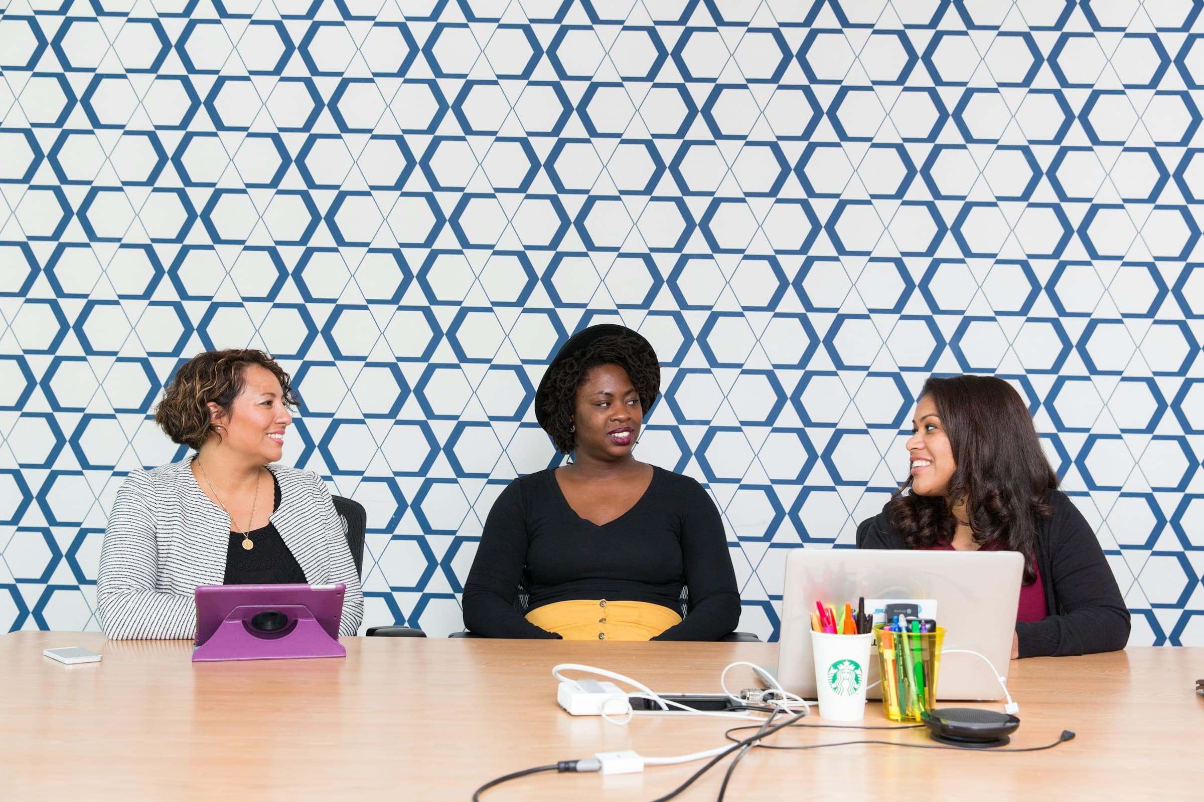 AI engineers and researchers collaborating in a modern studio office